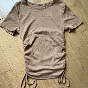 Tan cropped t shirt with scrunch on the side